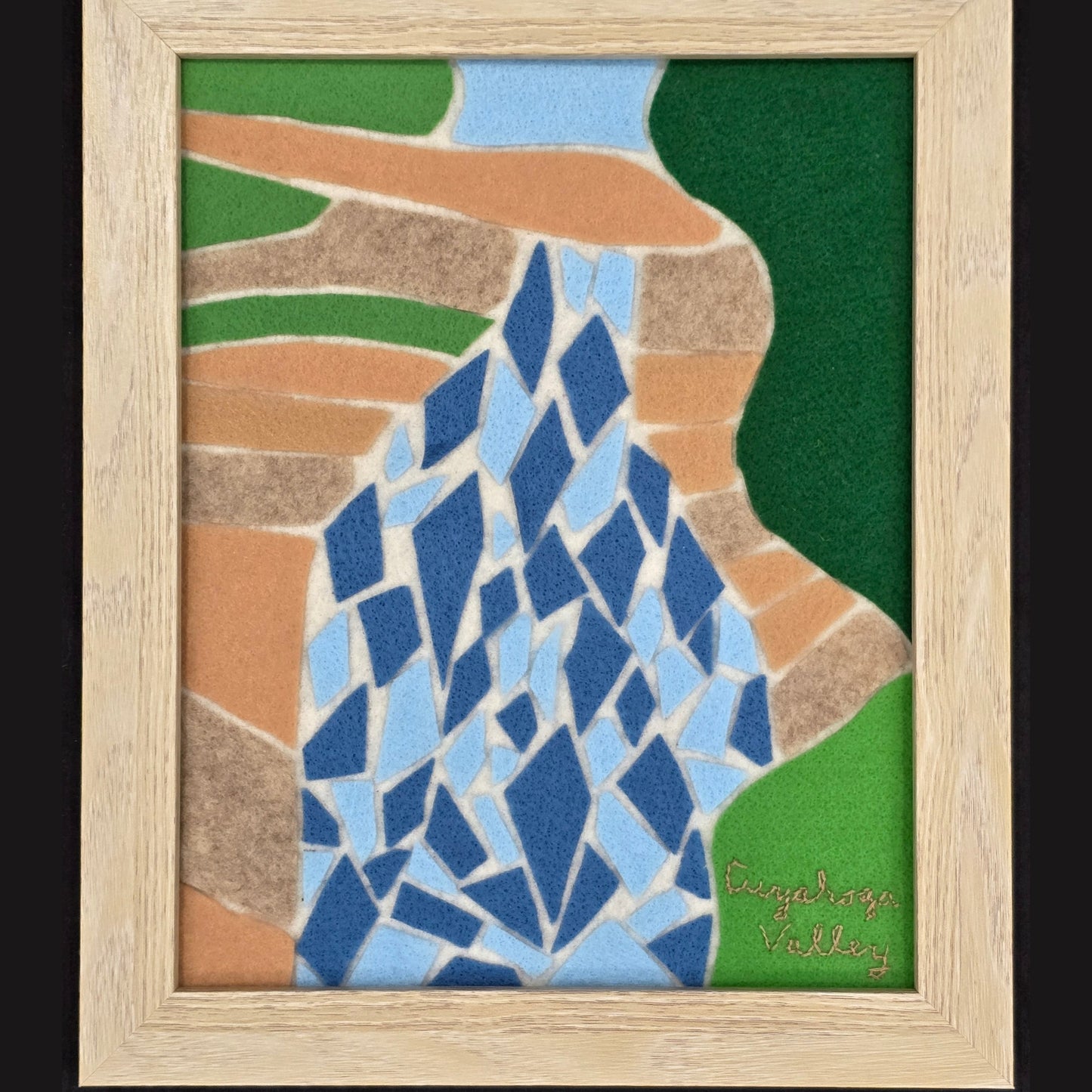 Abstract waterfall at Cuyahoga Valley National Park - neutral wood frame on black background.