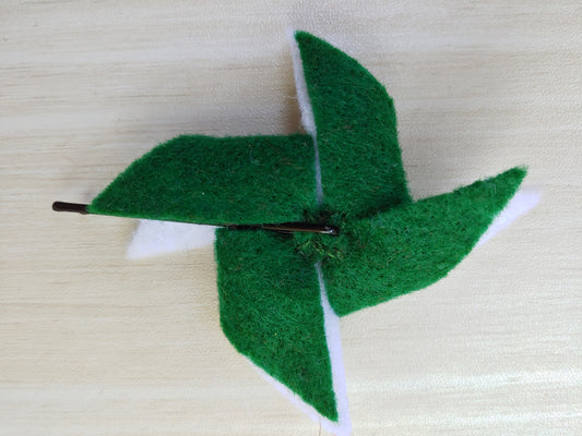 Handcrafted Green and White Pinwheel Felt Hair Clip with a secure bobby pin - reverse side. A fun and stylish hair accessory, perfect for school spirit & everyday looks.