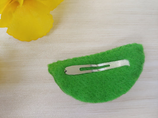 Handcrafted Watermelon Felt Hair Clip featuring bright pink, green, black, and white felt with a secure snap clip - reverse side shown. A fun summer accessory.