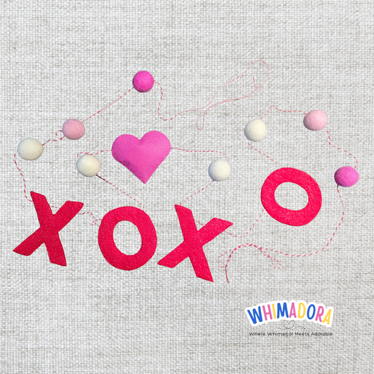 Decorative design with 'XOXO' and colorful hearts on a textured background, featuring the Whimadora brand.